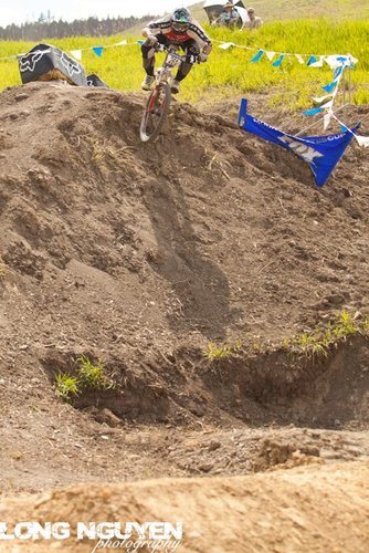 A Jamis rider taking line three of two to the finish